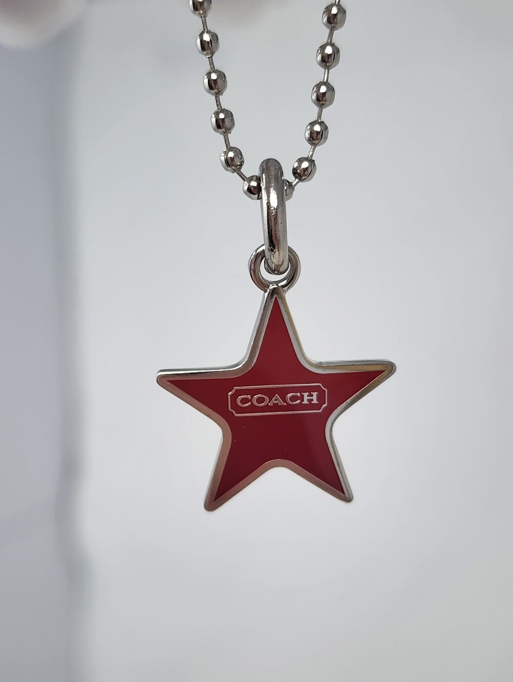 COACH Red Star Charm
